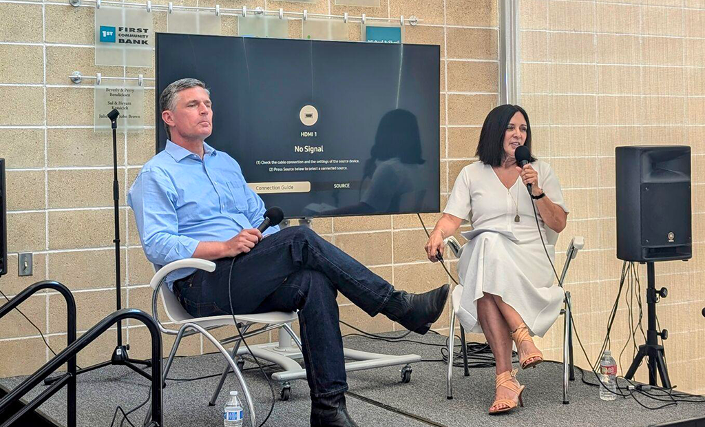 United States Senator Martin Heinrich, left, hosted an AI “fireside” chat with AI & You founder and CEO Susan Gonzales and a group of small-business owners at the WESST Enterprise Center on July 15.